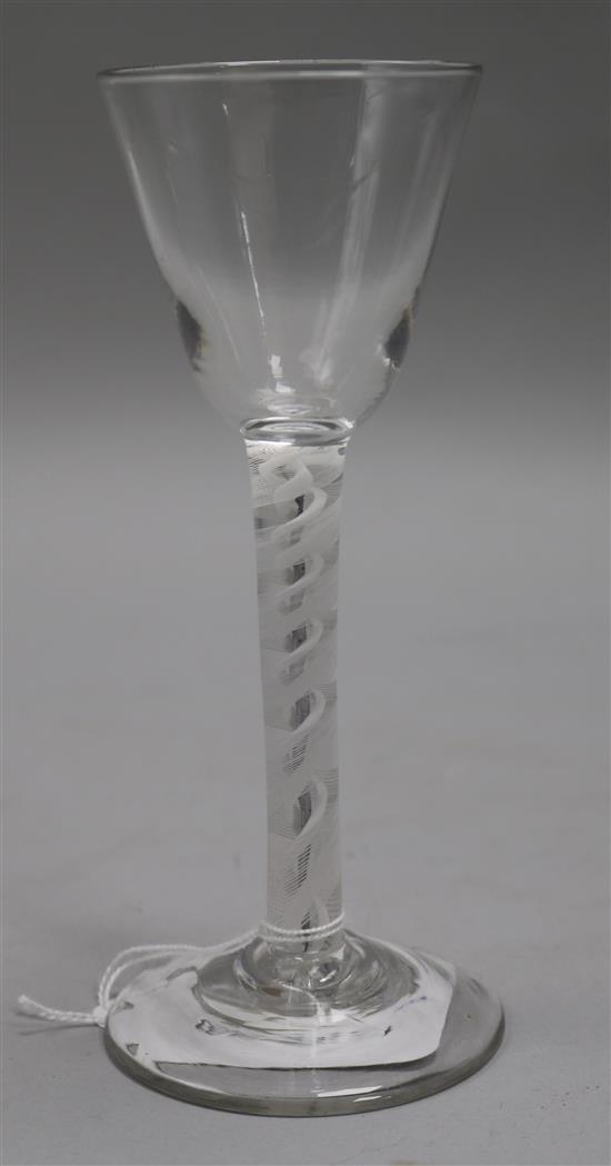 A double series opaque twist stemmed cordial glass, c.1770, with funnel bowl, 5.5in.